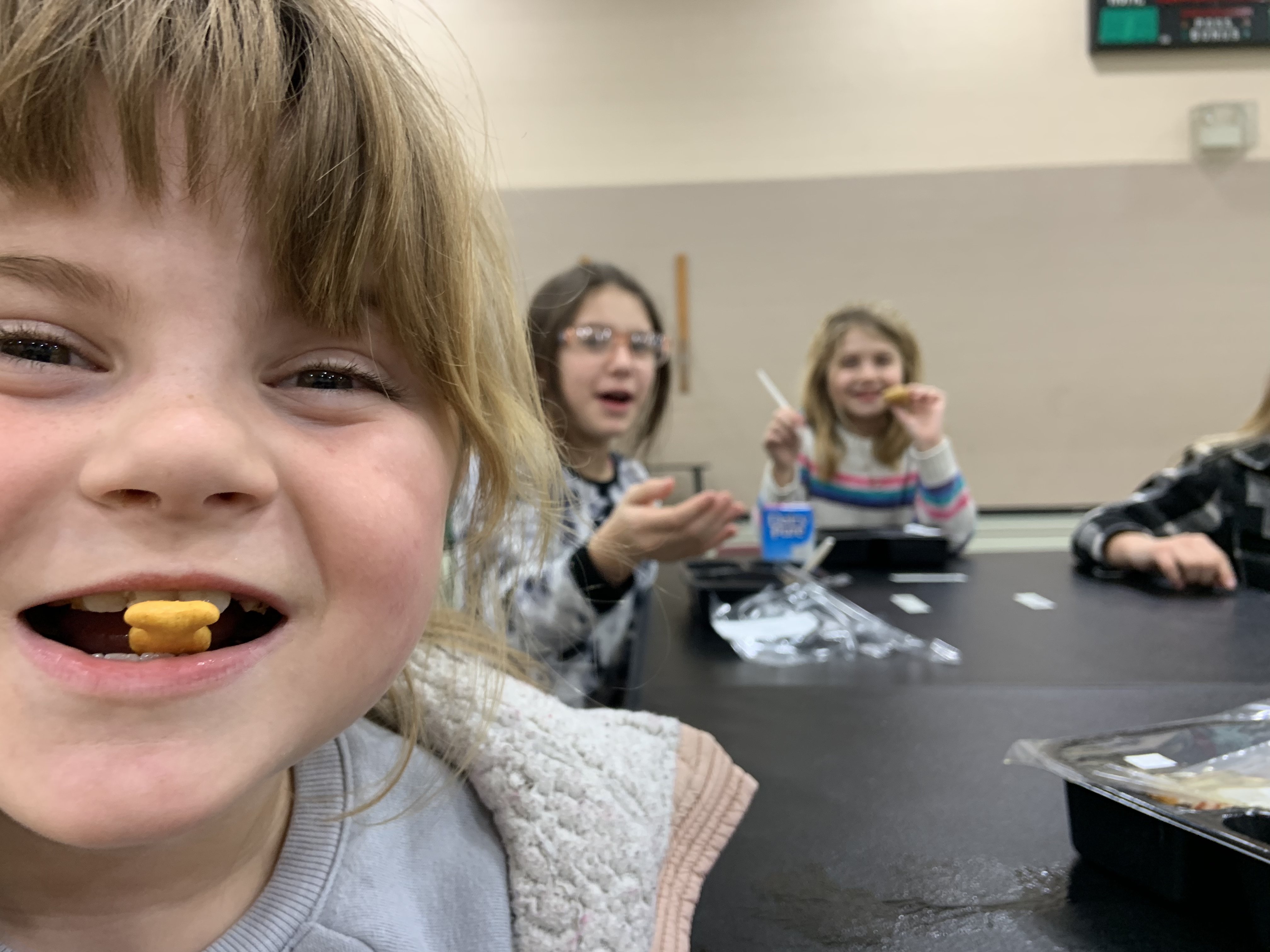 child eating a goldfish cracker